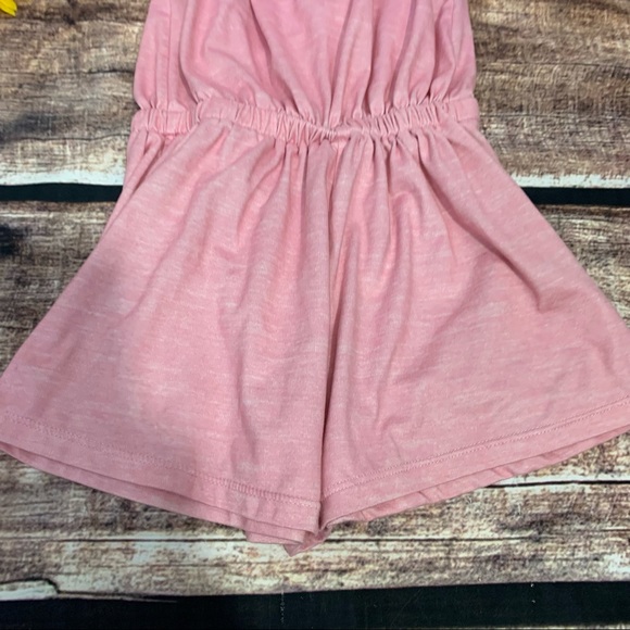 Girls pink romper by Young Hearts is in like new condition. Size 5 - Picture 6 of 8